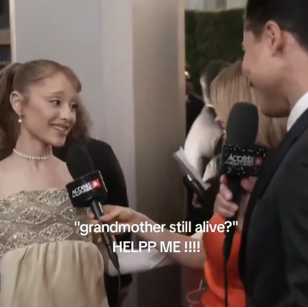 Ariana Grande being interviewed on a red carpet-style event. Text overlay reads, &quot;&#x27;grandmother still alive?&#x27; HELPP ME !!!!&quot;