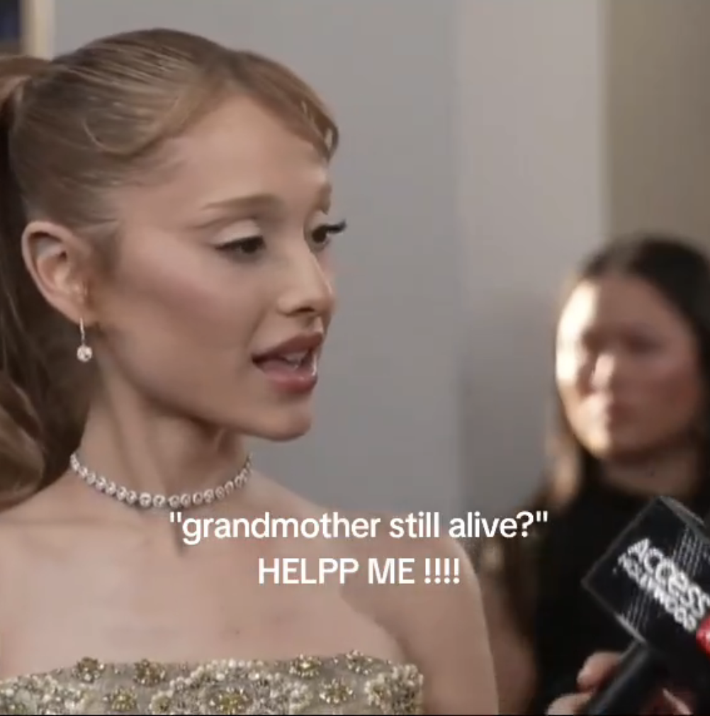 Ariana Grande in an elegant strapless dress being interviewed. Text on image reads: &quot;&#x27;grandmother still alive?&#x27; HELPP ME!!!!&quot;