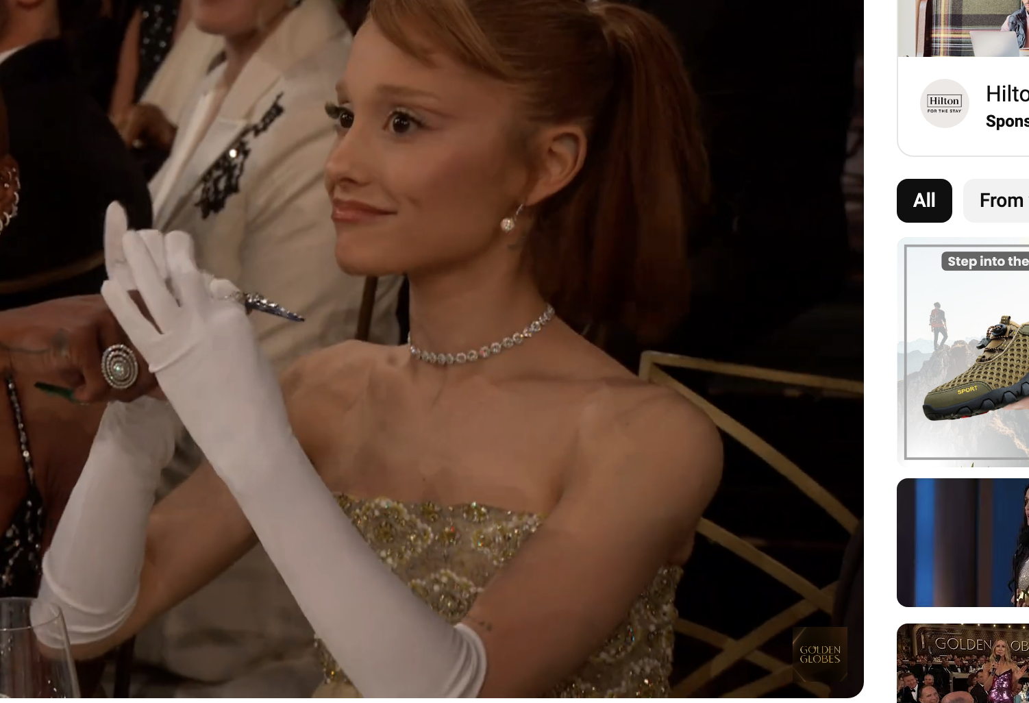 Ariana Grande holding Cynthia Erivo&#x27;s finger at the Golden Globes