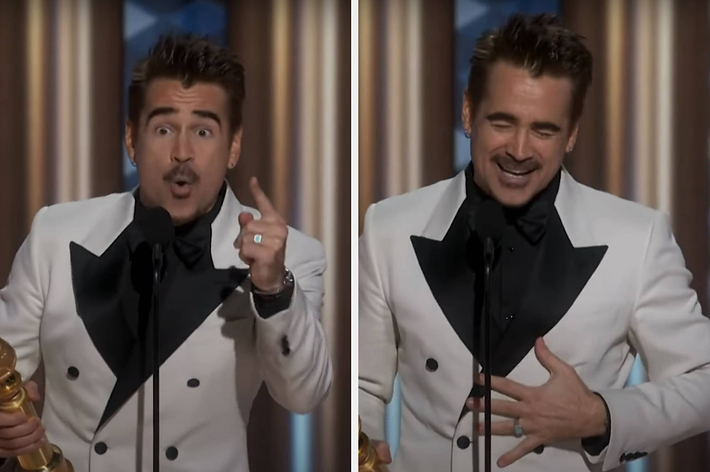 Man in tuxedo speaks animatedly at an awards event, holding a trophy. His expressions show excitement and gratitude