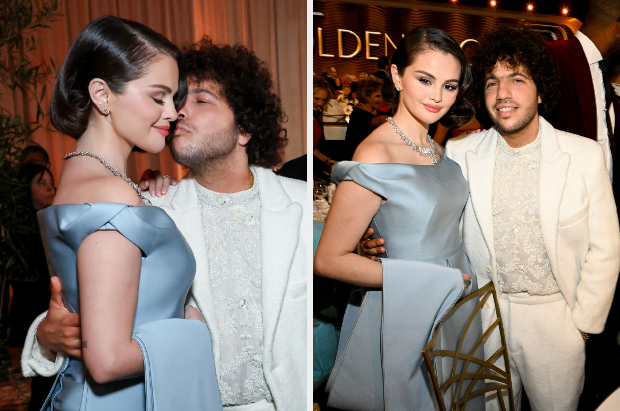 Two people at a formal event; the woman in an elegant off-shoulder gown, the man in a white suit with a textured shirt