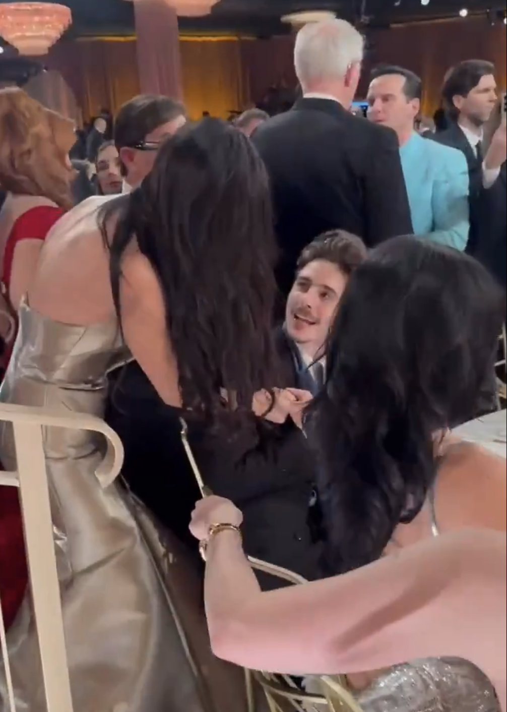 Demi Moore with her hand on Timothée Chalamet&#x27;s shoulder