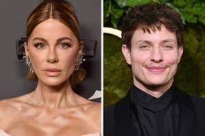 Two people at an event: a woman with elegant updo and statement earrings, and a man with short wavy hair in a suit