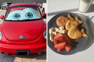 A red Volkswagen Beetle with cartoon eyes on the windshield. Plate with fish-shaped waffles, strawberries, bananas, and chips next to a glass of milk