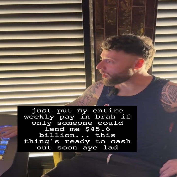 Man with tattoos sitting at a desk, wearing a sleeveless shirt, speaking animatedly. Text on image: "to pop aye."