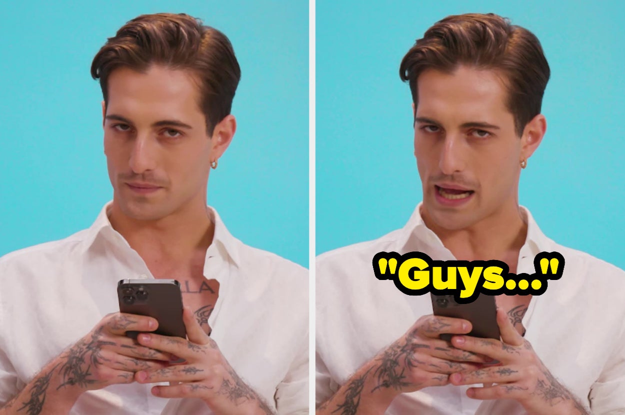 Person with tattoos is holding a phone, wearing a white shirt, and making a playful expression. Text reads “Guys...”