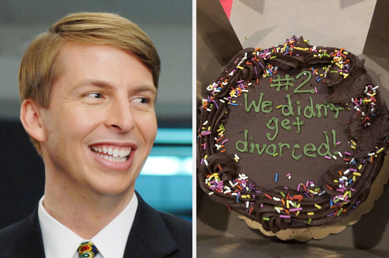 Person smiling beside a cake with "#2 We didn't get divorced!" written in icing, surrounded by colorful sprinkles