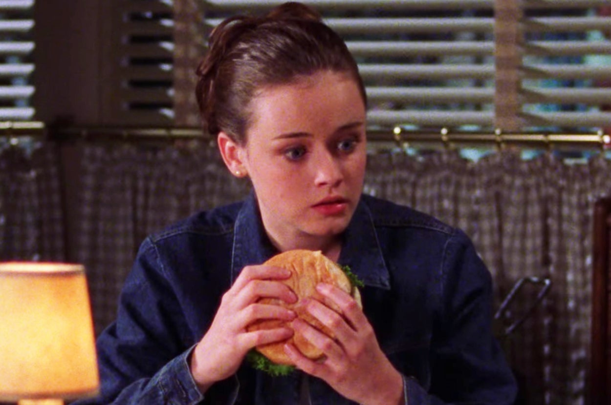 Rory Gilmore eating a burger