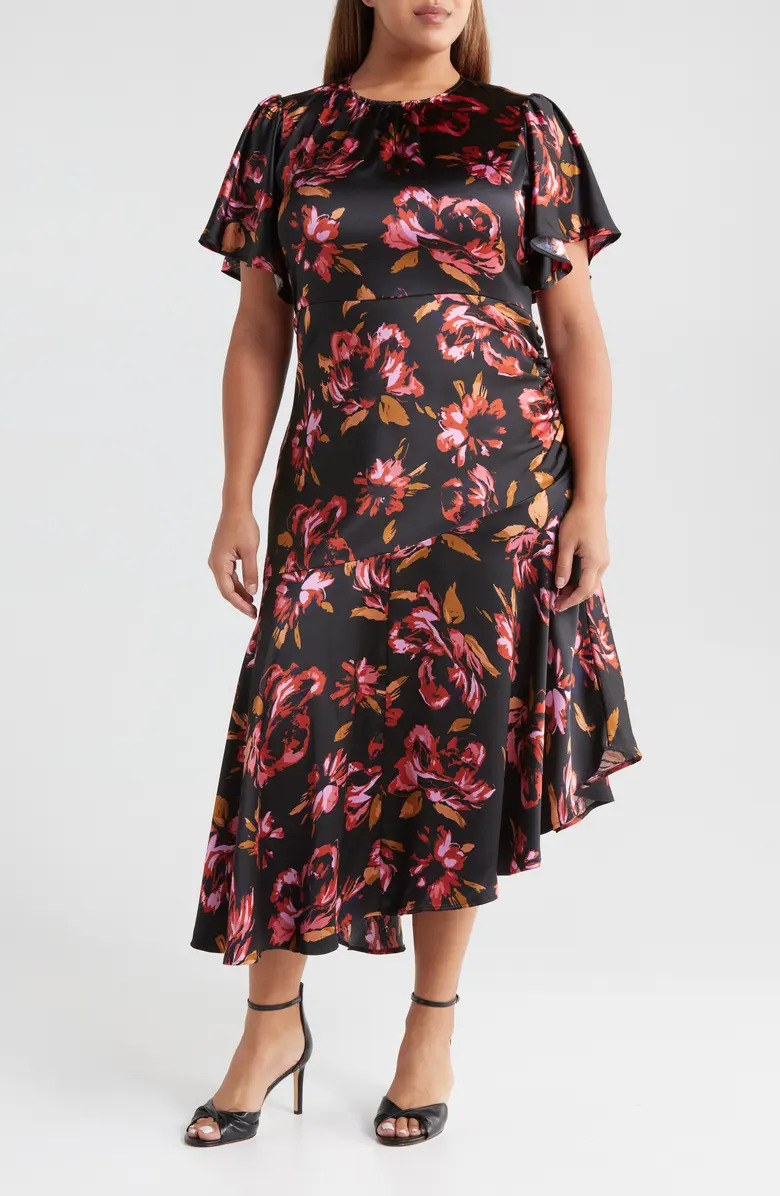 Model wearing the red floral dress