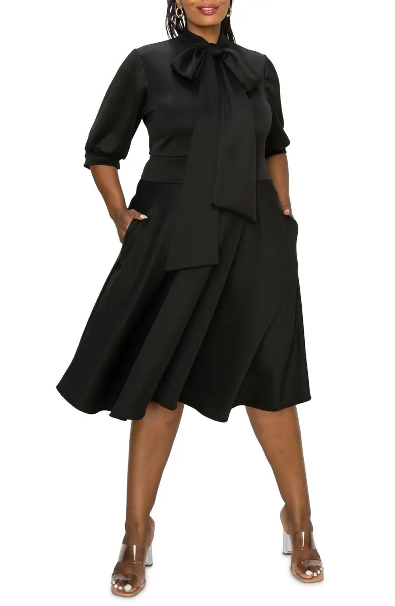 Model wearing the black dress