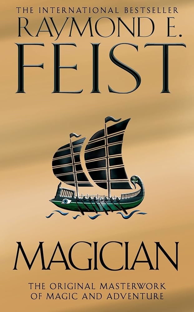 Book cover for &quot;Magician&quot; by Raymond E. Feist, featuring a stylized ship and text: &quot;The Original Masterwork of Magic and Adventure.&quot;