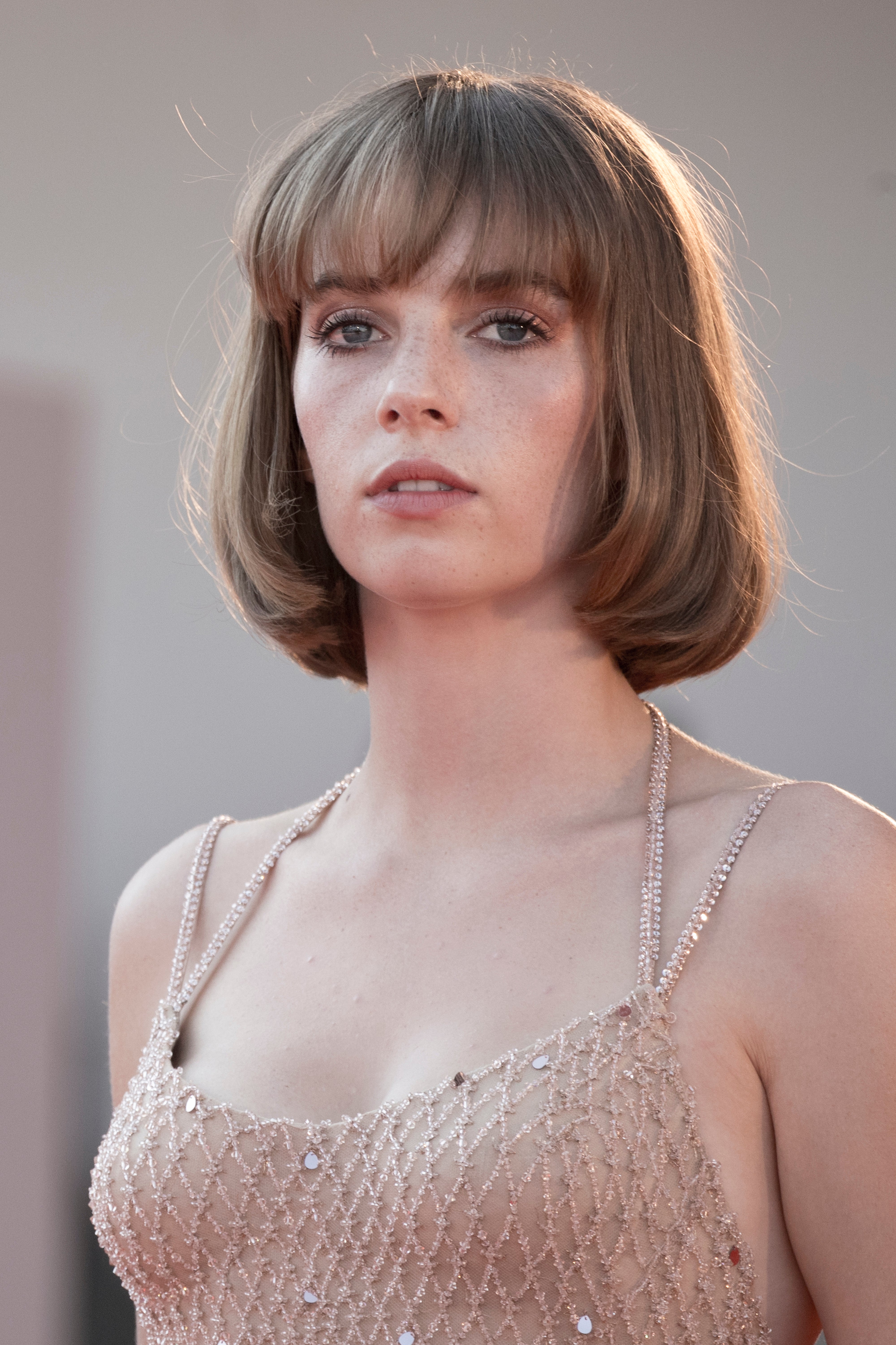 Maya Hawke in a beaded, spaghetti-strap dress on a red carpet event