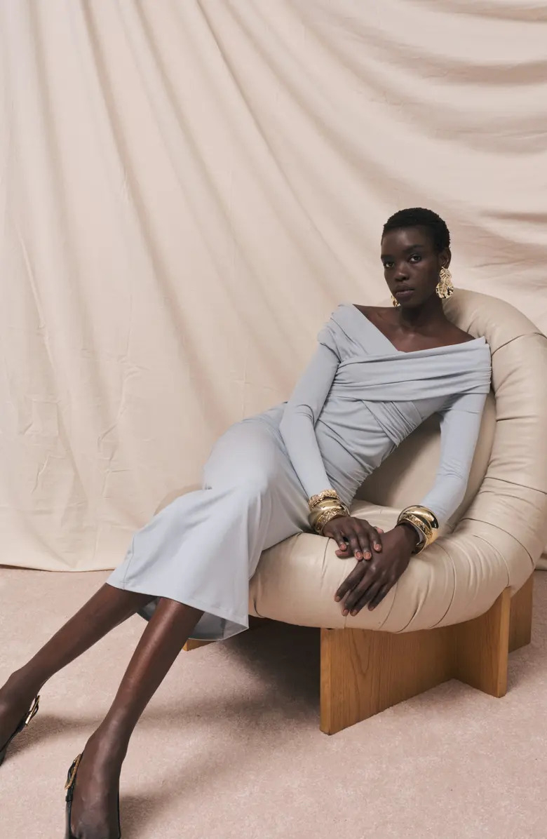 Model wearing the blue fog dress