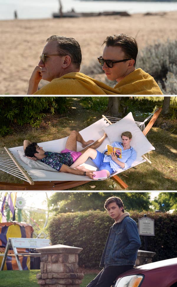 Two people relax on a hammock outdoors, one reading a book. One wears a floral shirt and shorts, the other a button-up and shorts