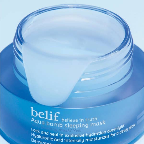 Open jar of Belif Aqua Bomb Sleeping Mask with product description text