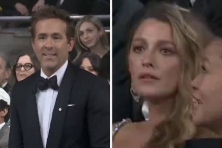 A man in a black tuxedo and a woman in a dress are seen at a formal event, surrounded by other attendees