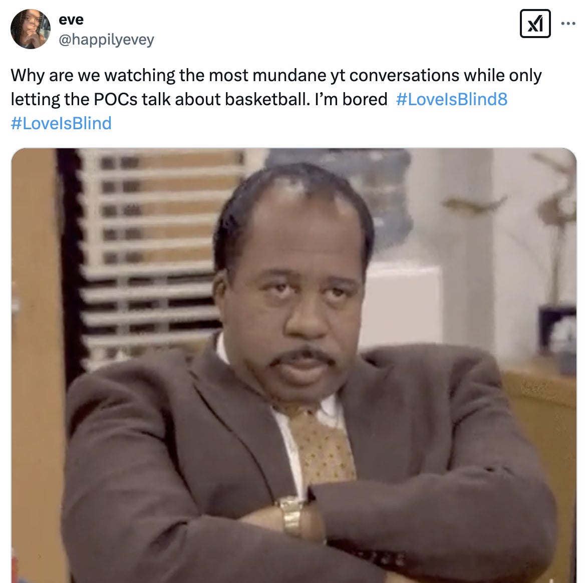 Man in a suit sitting with a bored expression. Tweet above expresses frustration about mundane conversations on "Love is Blind" and includes hashtags #LoveIsBlind