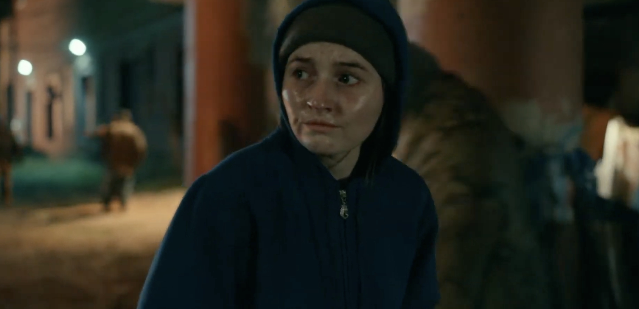 Kaitlyn Dever wears a hoodie and looks unwell in character in Dopesick