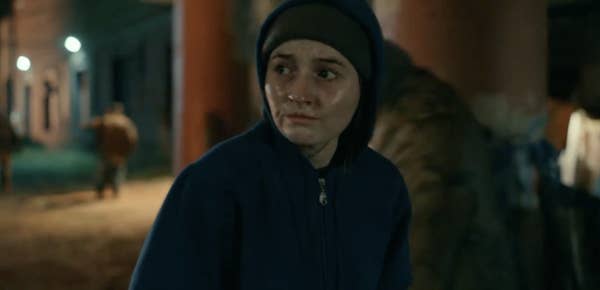 Kaitlyn Dever wears a hoodie and looks unwell in character in Dopesick
