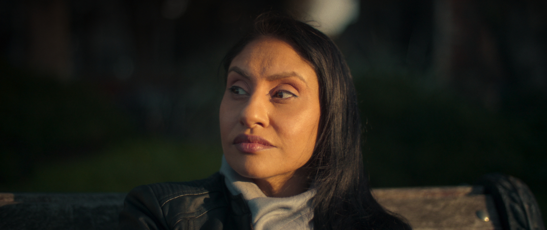 Kirat looks off into the distance
