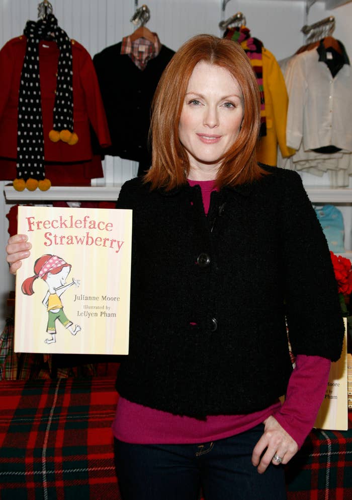 Person holding a children's book titled 