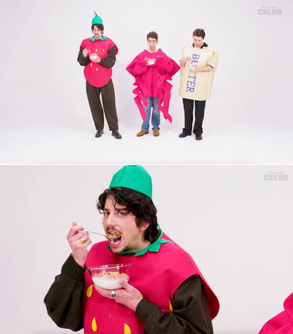 A close-up of Milo dressed as a strawberry eating cereal
