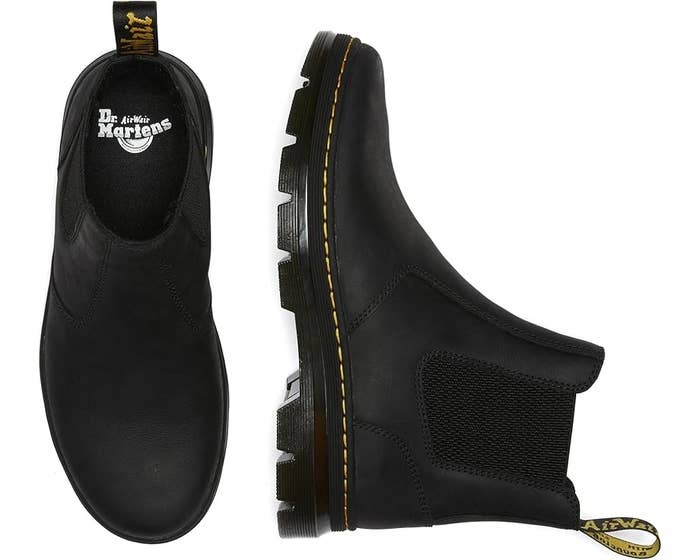 One achromatic Dr. Martens Chelsea footwear shown from the broadside and top, featuring disposable stitching and elastic panels for casual fitting