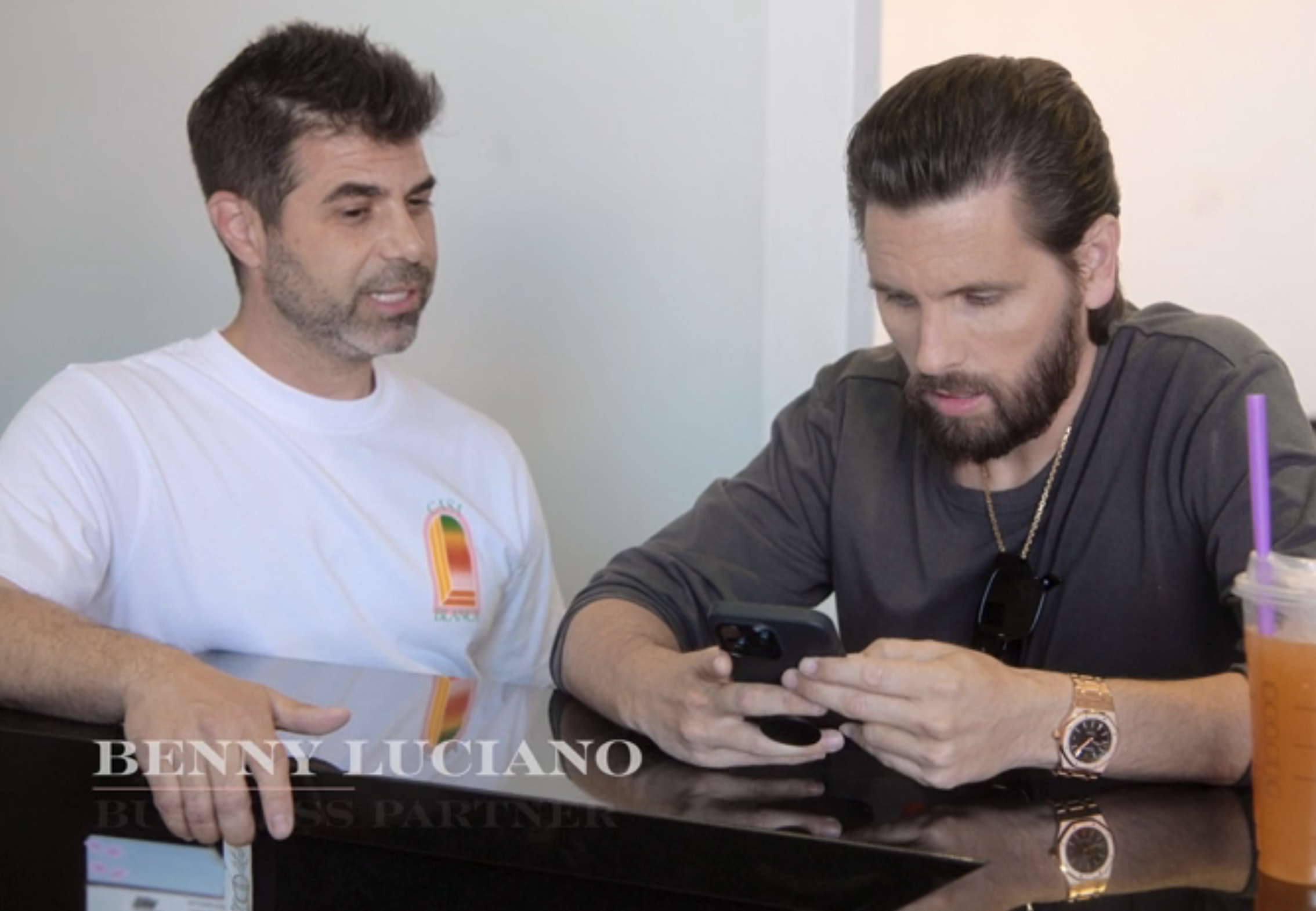 Scott Disick and Benny Luciano talking in a scene from "The Kardashians"