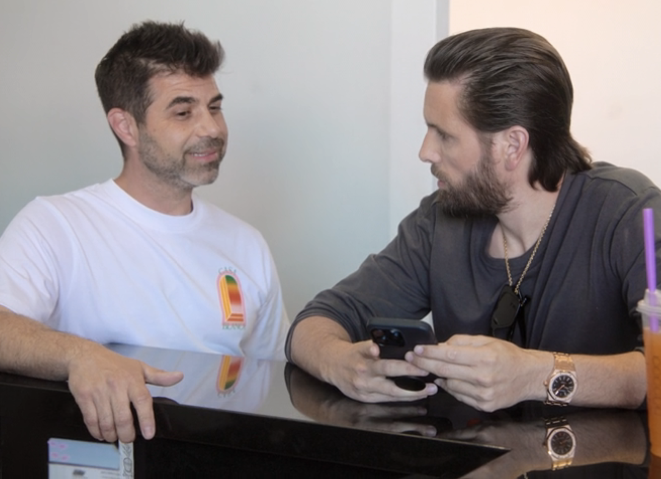 Scott Disick and Benny Luciano talking in a scene from "The Kardashians"