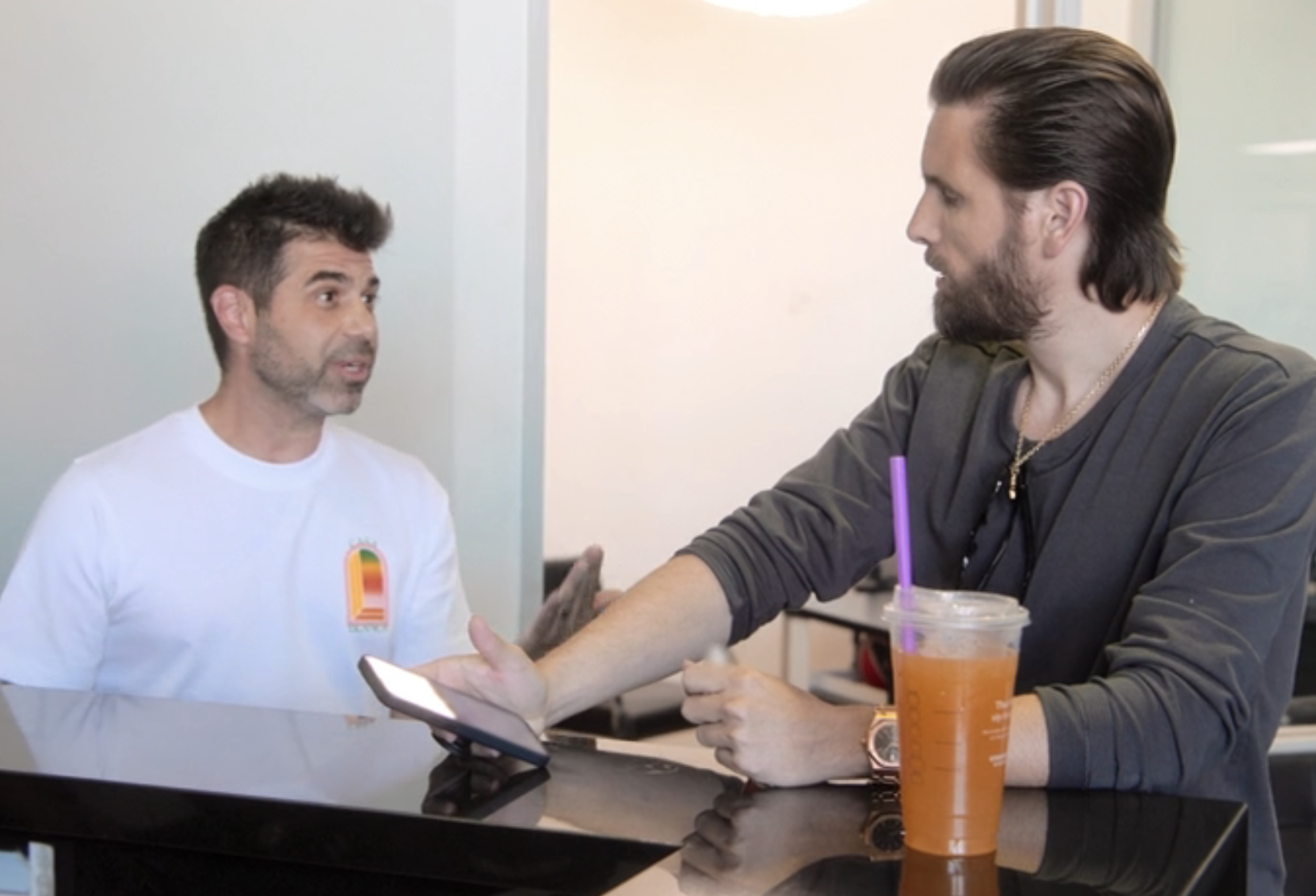 Scott Disick and Benny Luciano talking in a scene from "The Kardashians"
