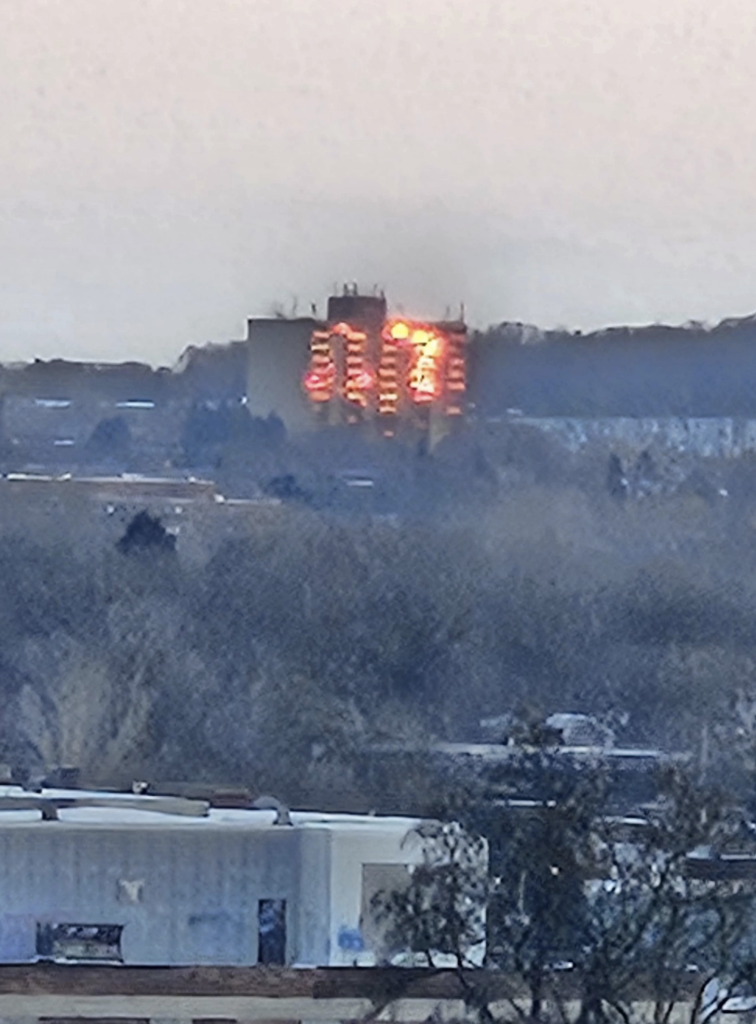 Distant presumption    of a gathering  connected  occurrence  with disposable   flames successful  aggregate  windows, emitting smoke