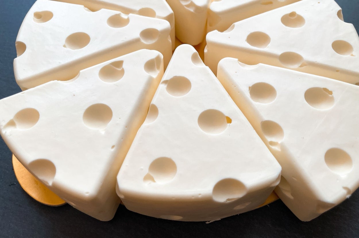 RUNNYCHEESE（ラニーチーズ）のレアチーズケーキが、凹凸の分かる拡大写真になっている。