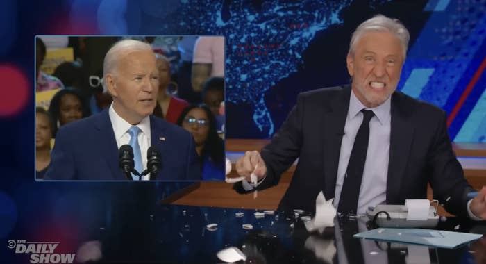 TV host dramatically tears papers while discussing a speech by a prominent political figure shown in a TV screen inset