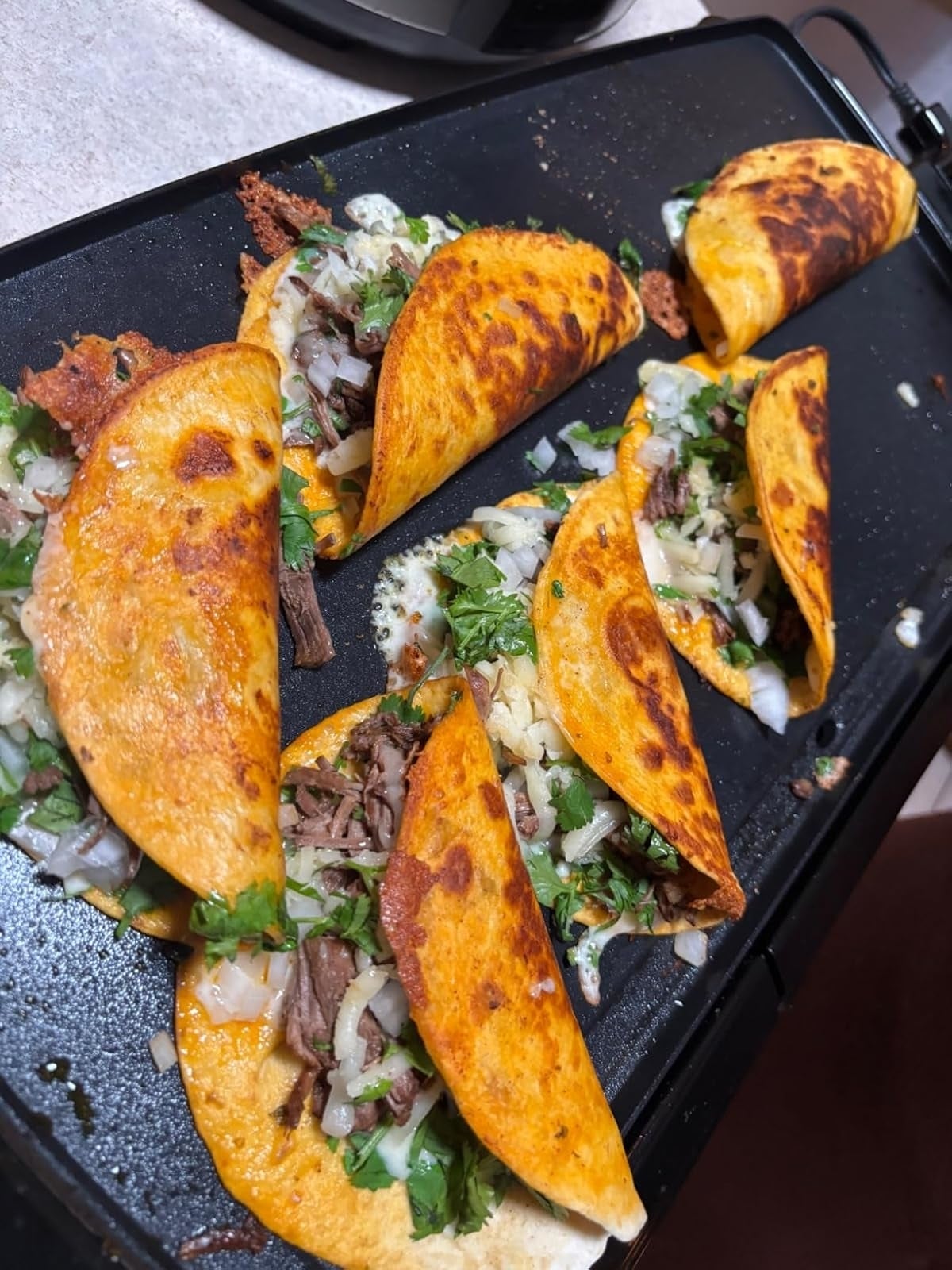 reviewer's tacos cooking