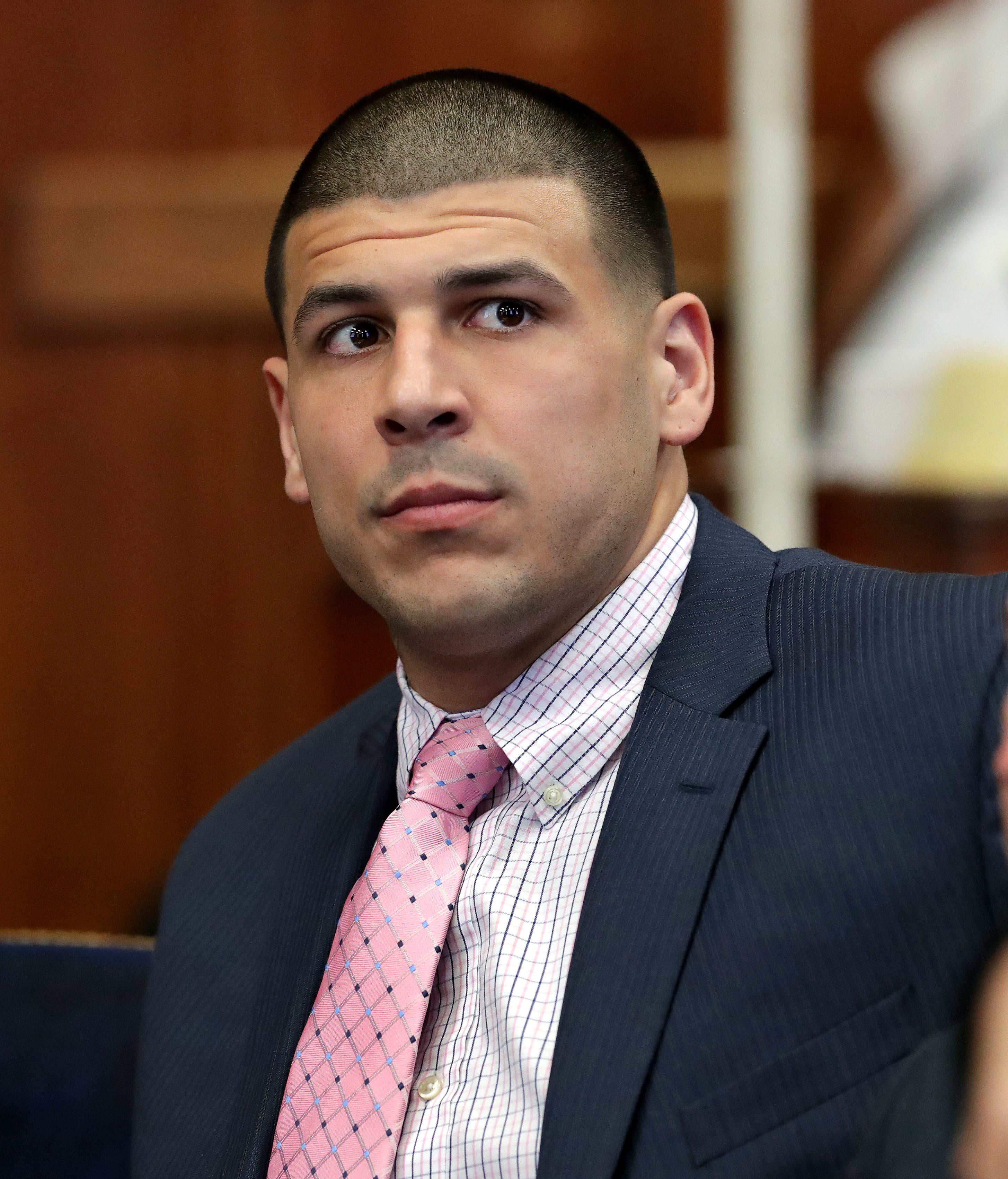 Aaron Hernandez sitting in court.