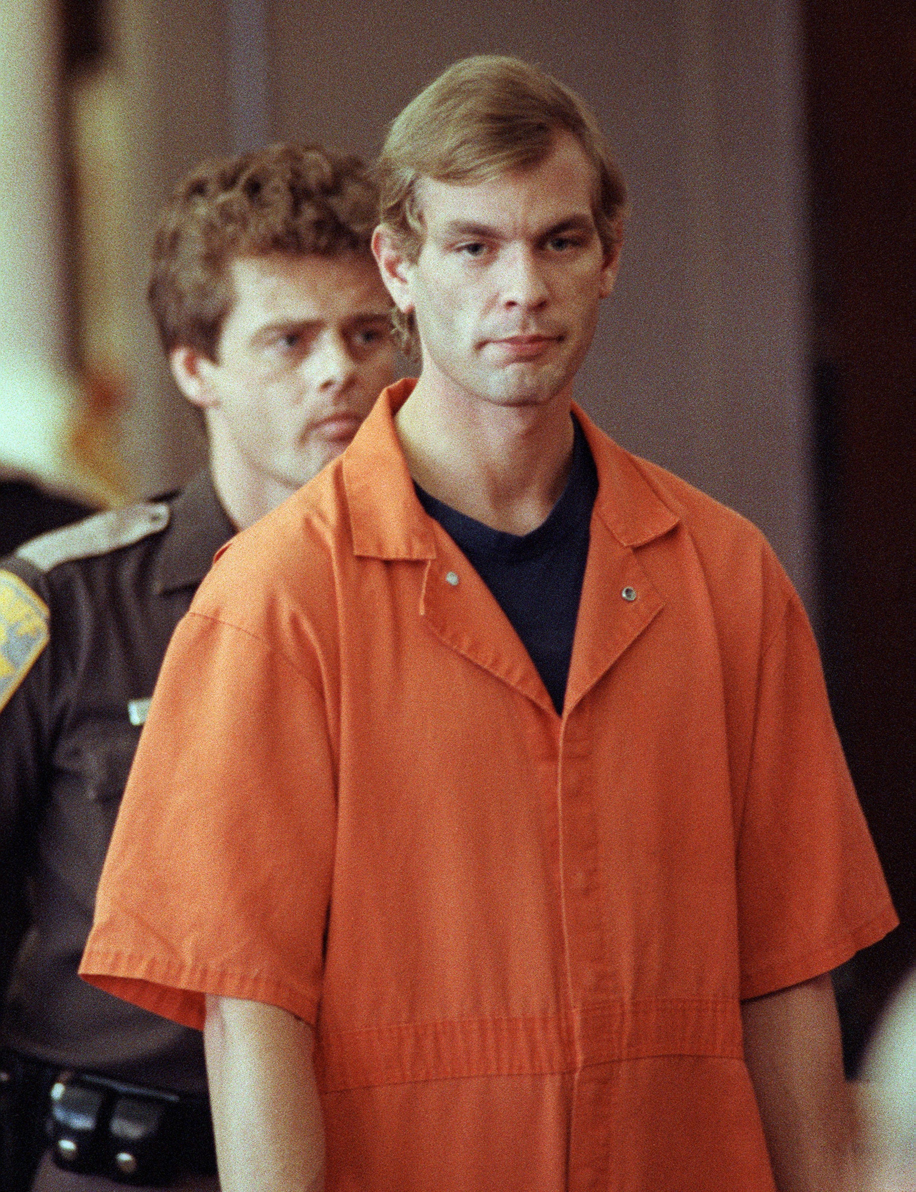 Jeffrey Dahmer in an orange jumpsuit.