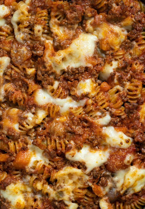 Close-up of baked pasta with melted cheese and meat sauce