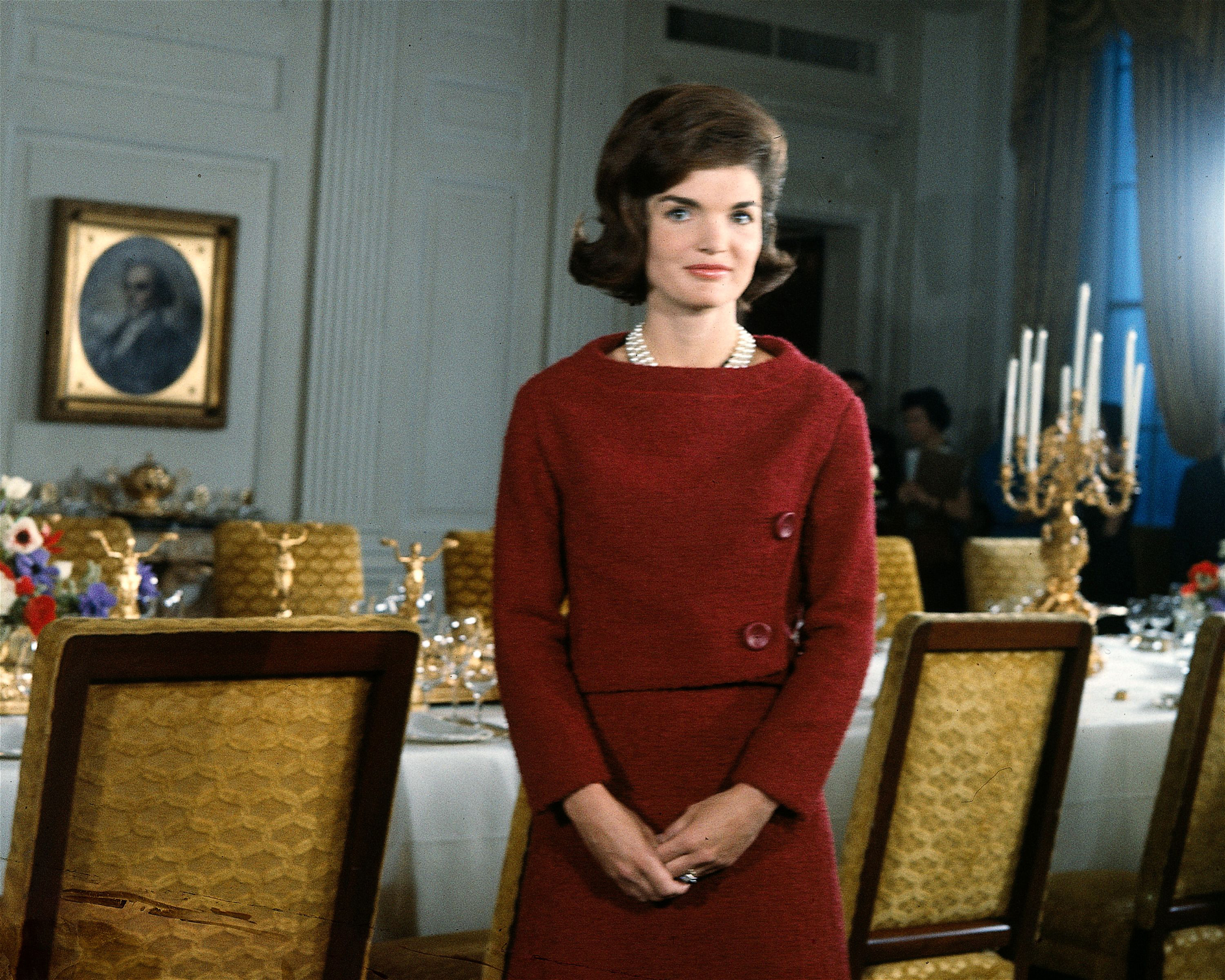 Jacqueline Kennedy in a red suit in 1962.