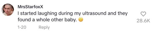Comment about laughter during an ultrasound, revealing a surprise second baby with an upside emoji