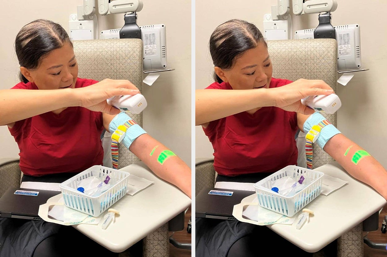 Person in a medical setting applies a scanner to their arm, with multiple colorful bands visible. Medical supplies and equipment are in the background