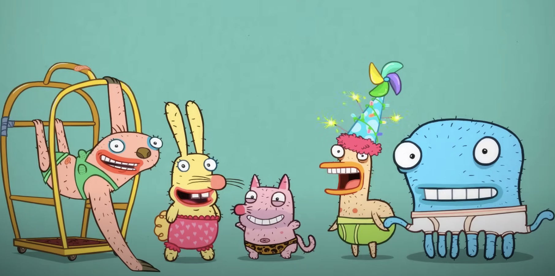 Cartoon monsters gathered, one with a party hat, another with a bowtie. They're animated characters from a TV show