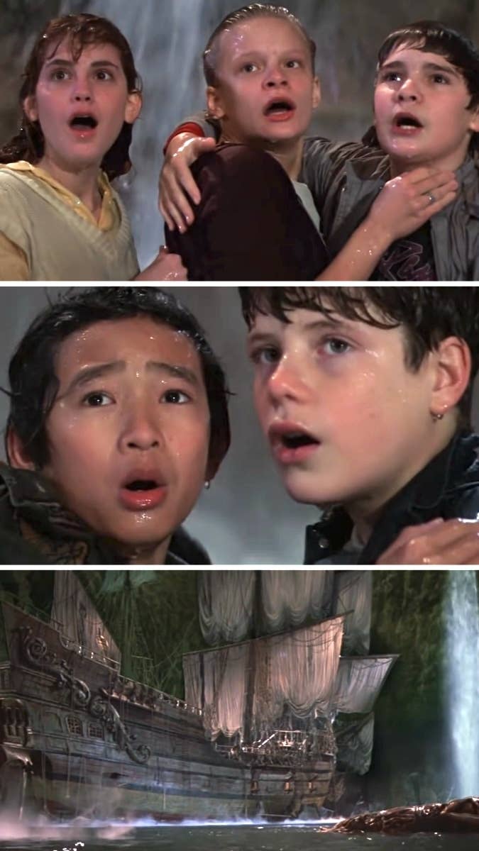 The kids see a giant pirate ship with expressions of awe