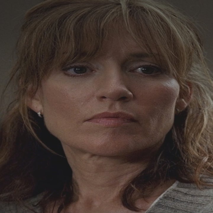 Katey Sagal as helen in Lost with shoulder-length hair looks contemplative, wearing a knit sweater indoors