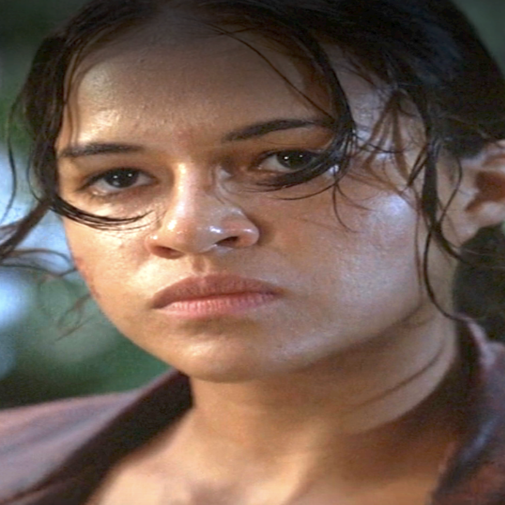 Ana Lucia in Lost with wet hair and intense expression, wearing a leather jacket, in an outdoor setting