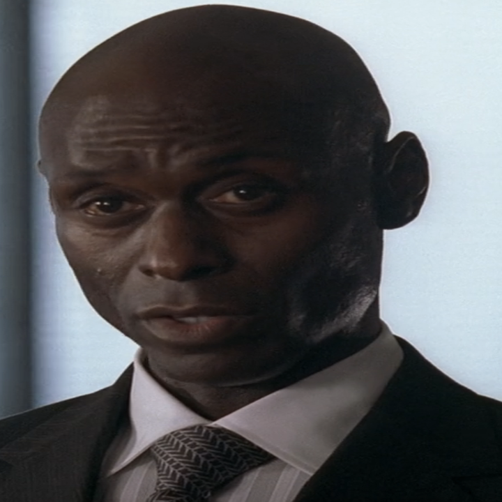 Lance Reddick in Lost wearing a suit and tie gazing forward