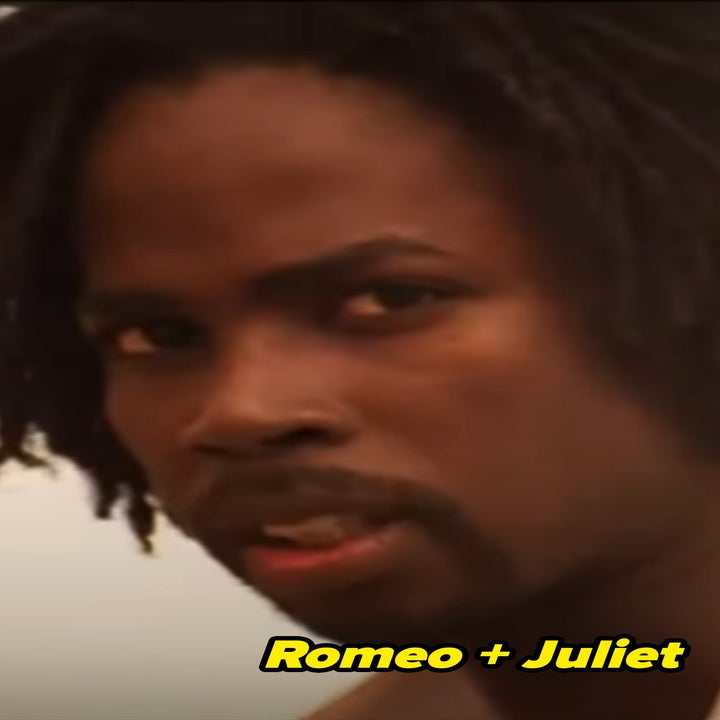 harold as mercutio with short dreadlocks looks intently at the camera, wearing a white shirt