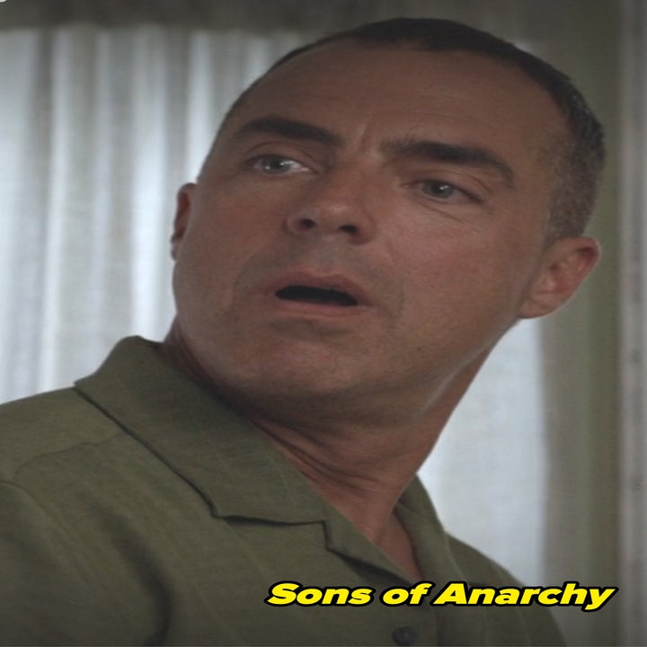 Titus as Jimmy in Sons of Anarchy with a surprised expression indoors, wearing a collared shirt