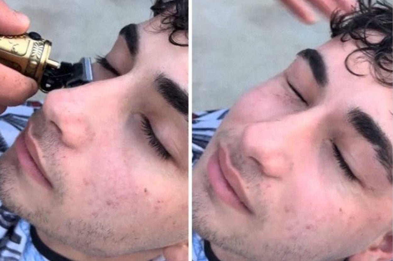 Person receiving an eyebrow trim with a small electric trimmer while eyes are closed, showing relaxation