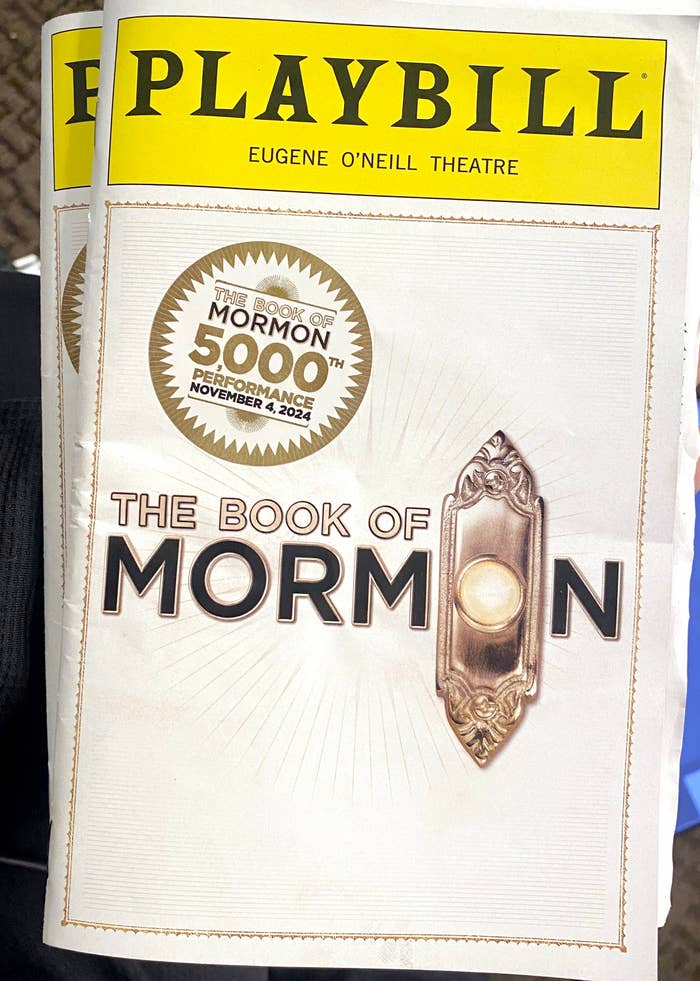 Playbill for "The Book of Mormon" 5000th performance at Eugene O'Neill Theatre, featuring a doorbell illustration on the cover