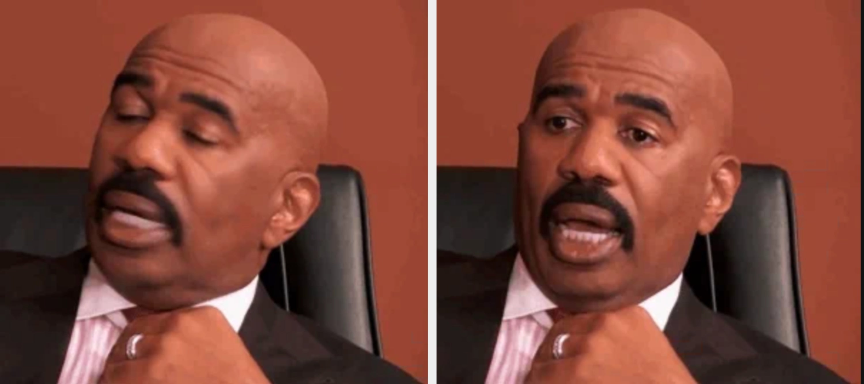 A person with a mustache is sitting in a chair, eyes closed, appearing relaxed or thoughtful. They are wearing a suit with a patterned tie